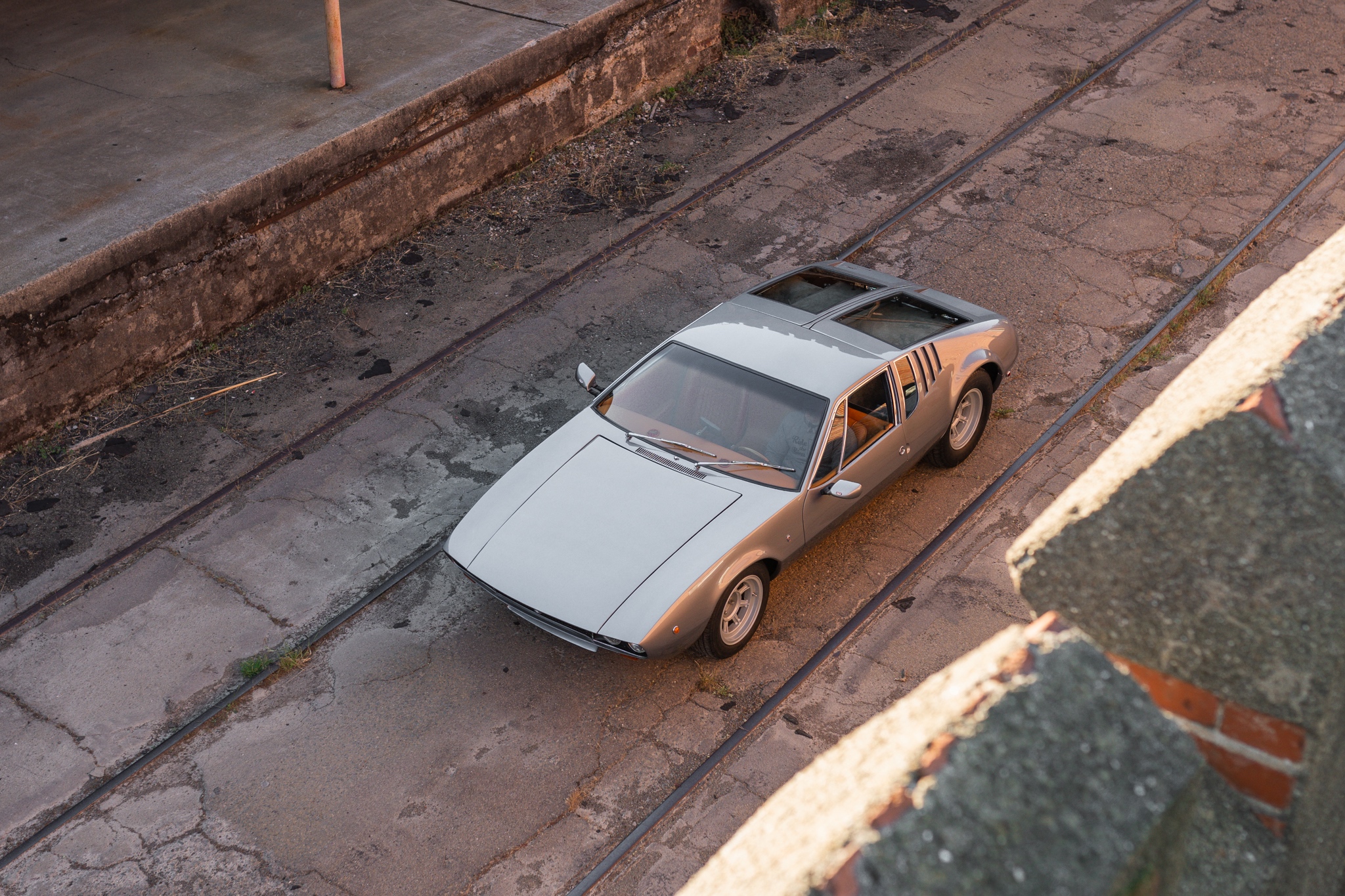 Aerial view of a 1969 gray De Tomaso Mangusta