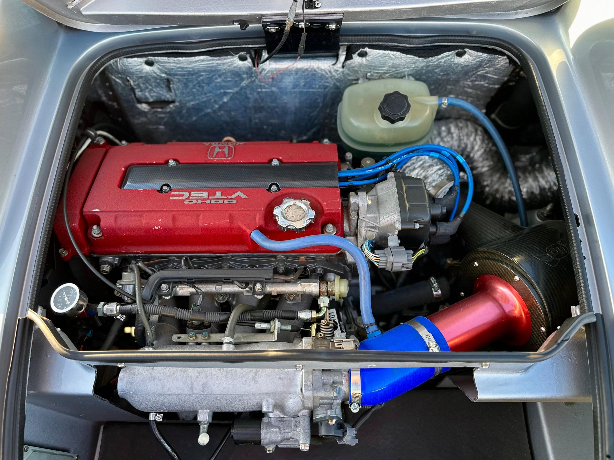 Engine bay of a 1999 Lotus Elise 111 S