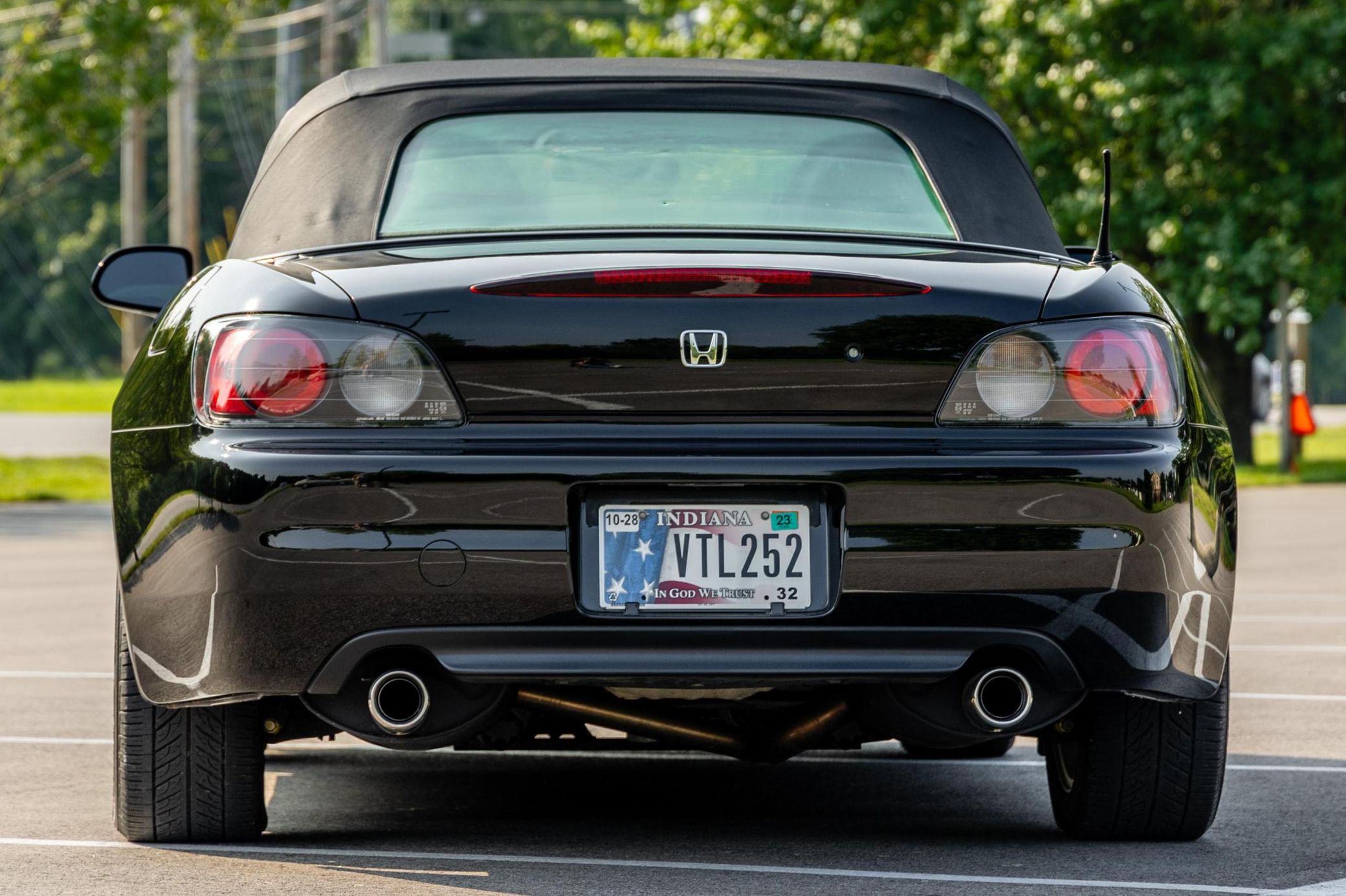 Rear view of a 2000 black Honda S2000
