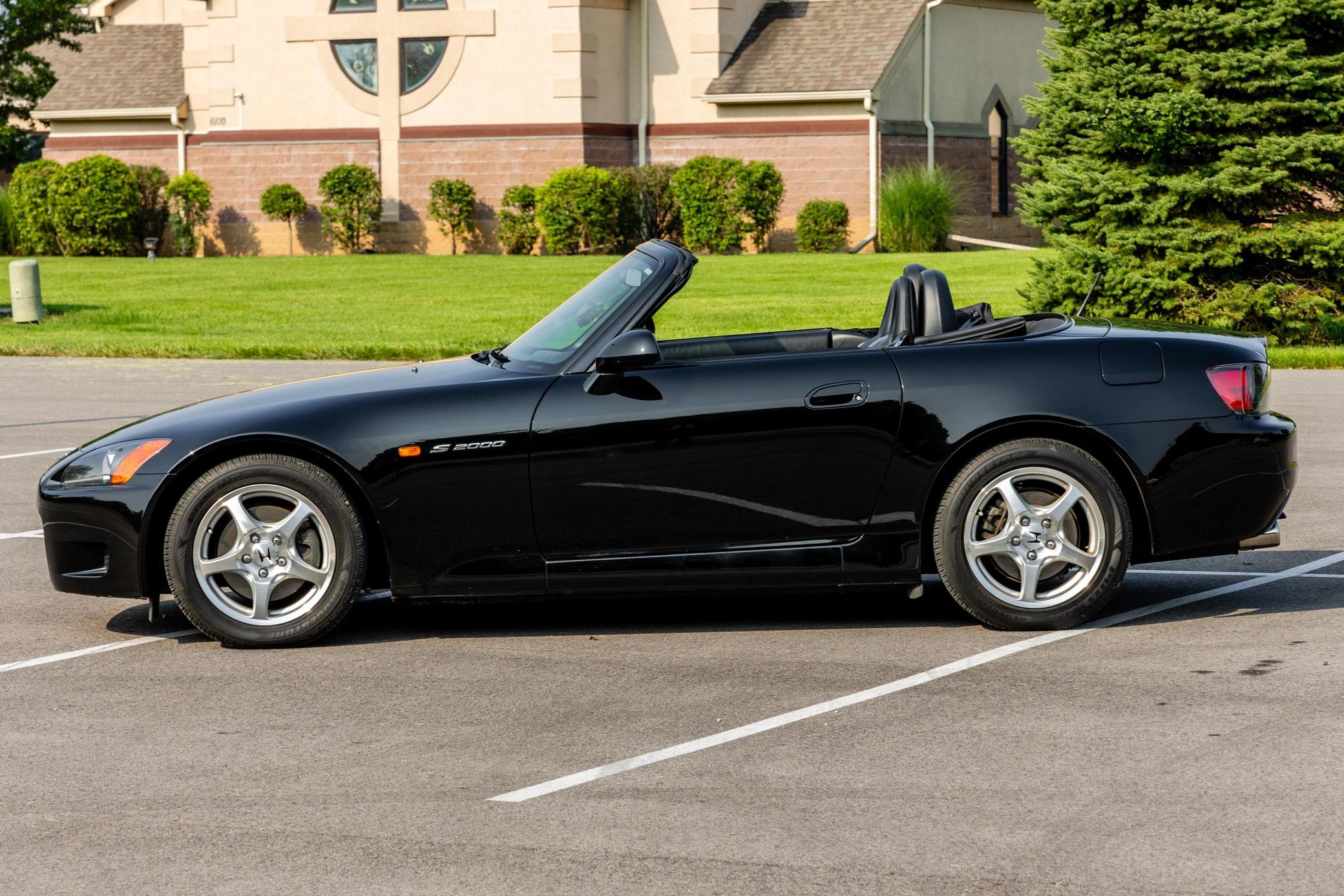Side view of a 2000 black Honda S2000