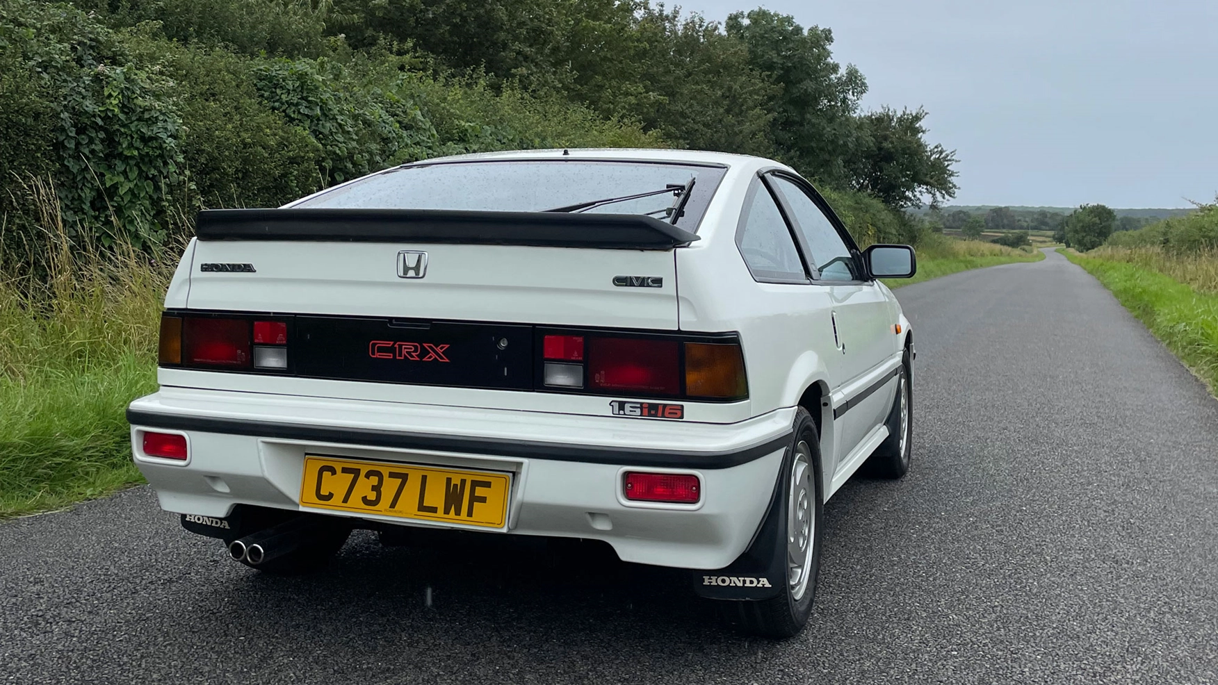 Rear view of a 1985 white Honda CR-X
