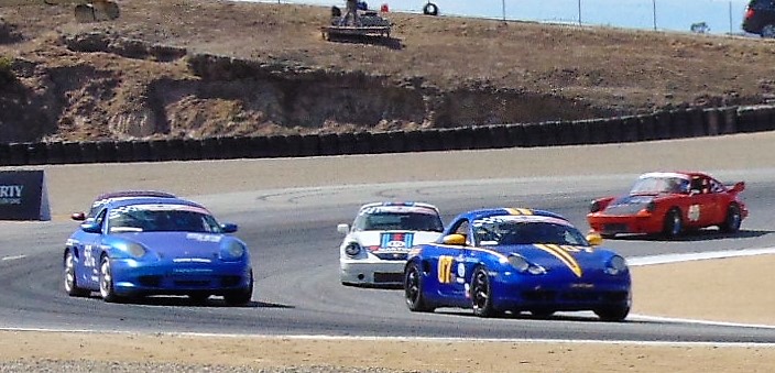 Porsche 911 models on track