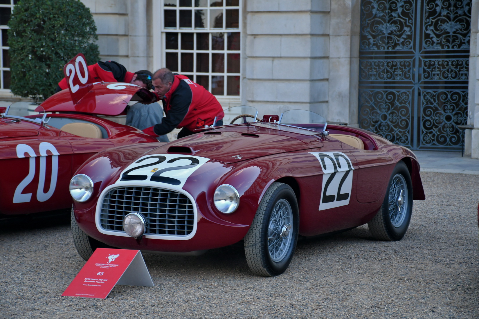 Red Ferrari 166MM from 1949 chassis number 0008 with the racing number 22 on the sides