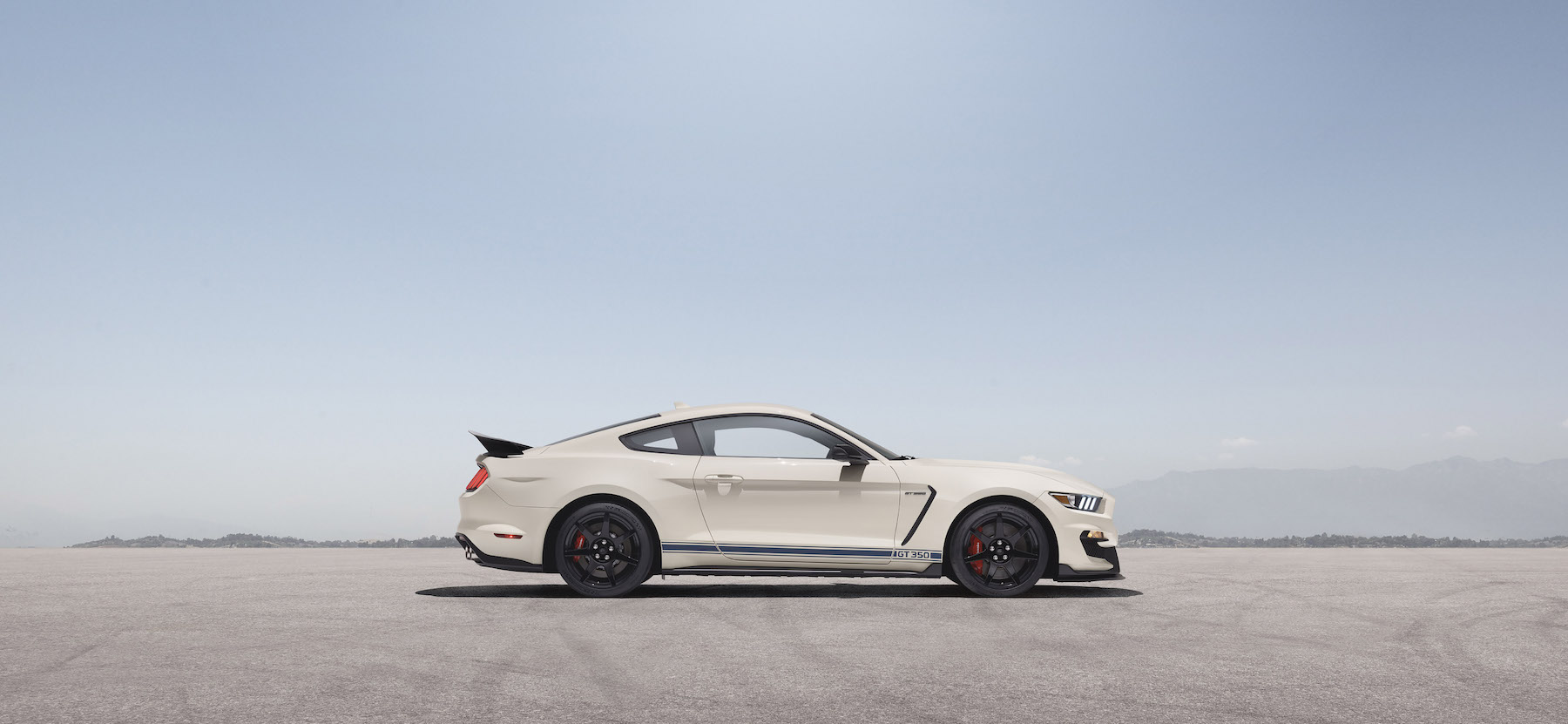 Heritage Edition Package available on 2020 Mustang Shelby GT350 and GT350R models features a unique throwback livery with Wimbledon White paint and Guardsman Blue side and over-the-top racing stripes
