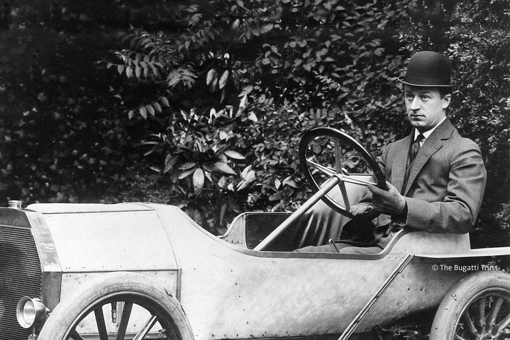 Ettore Bugatti and his Bugatti Type 10 Automobile.