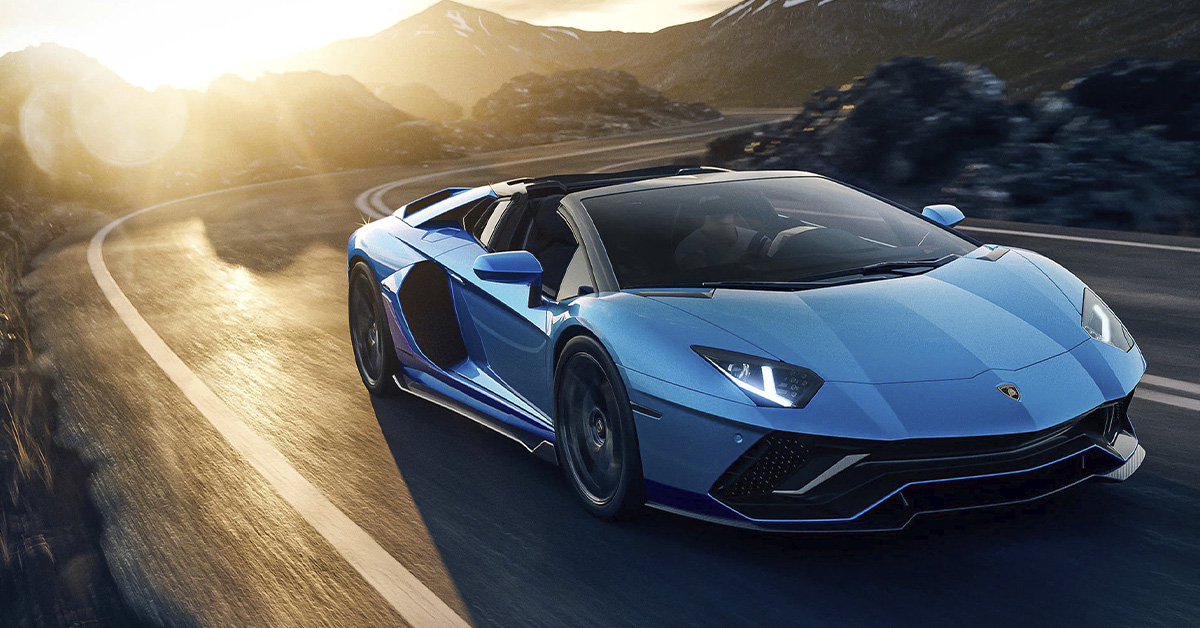 2022 blue Lamborghini Aventador Ultimate on winding road
