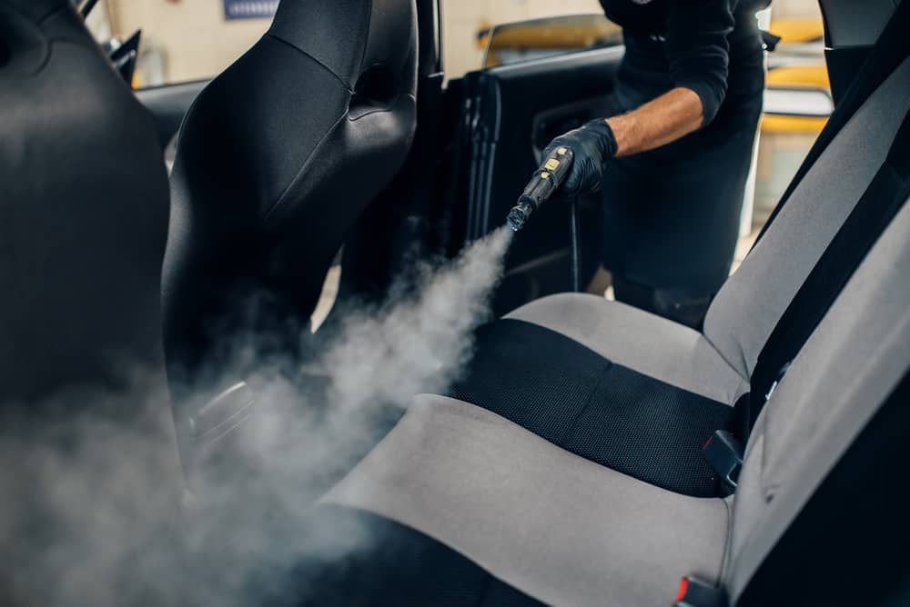 clean steaming interior car seats