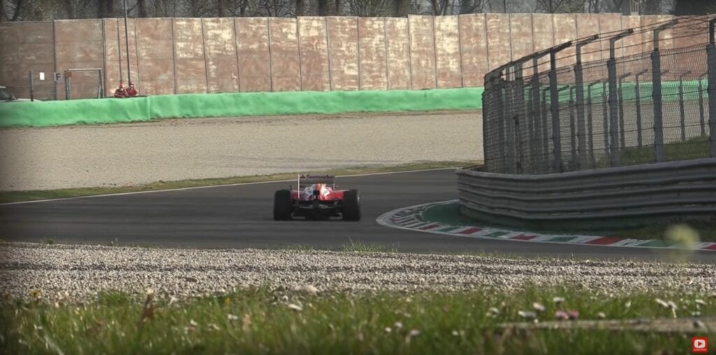 2013 F138 Fernando Alonso screaming through Lesmo 1