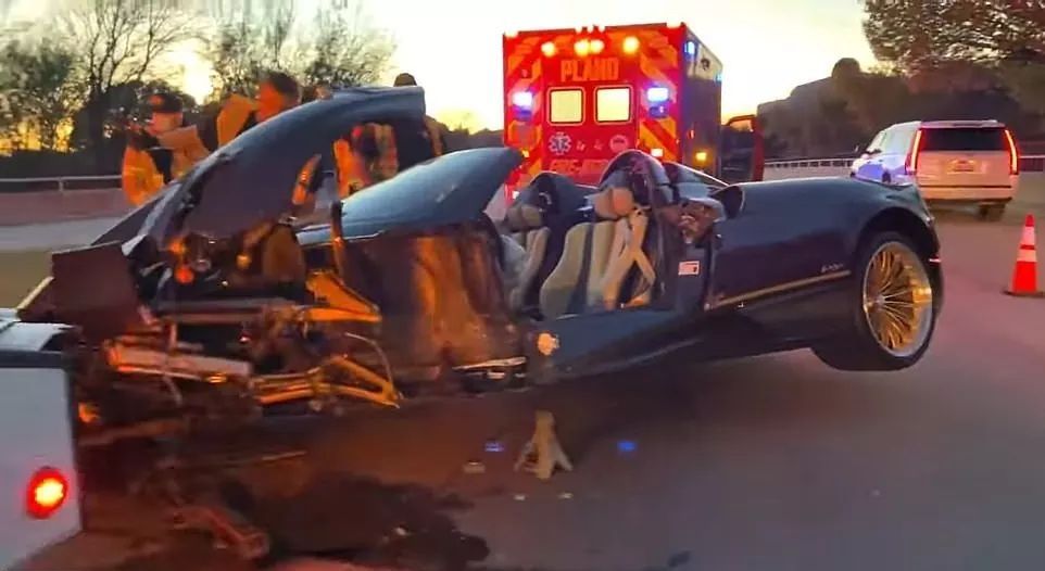 Crashed Pagani with Ambulance in background