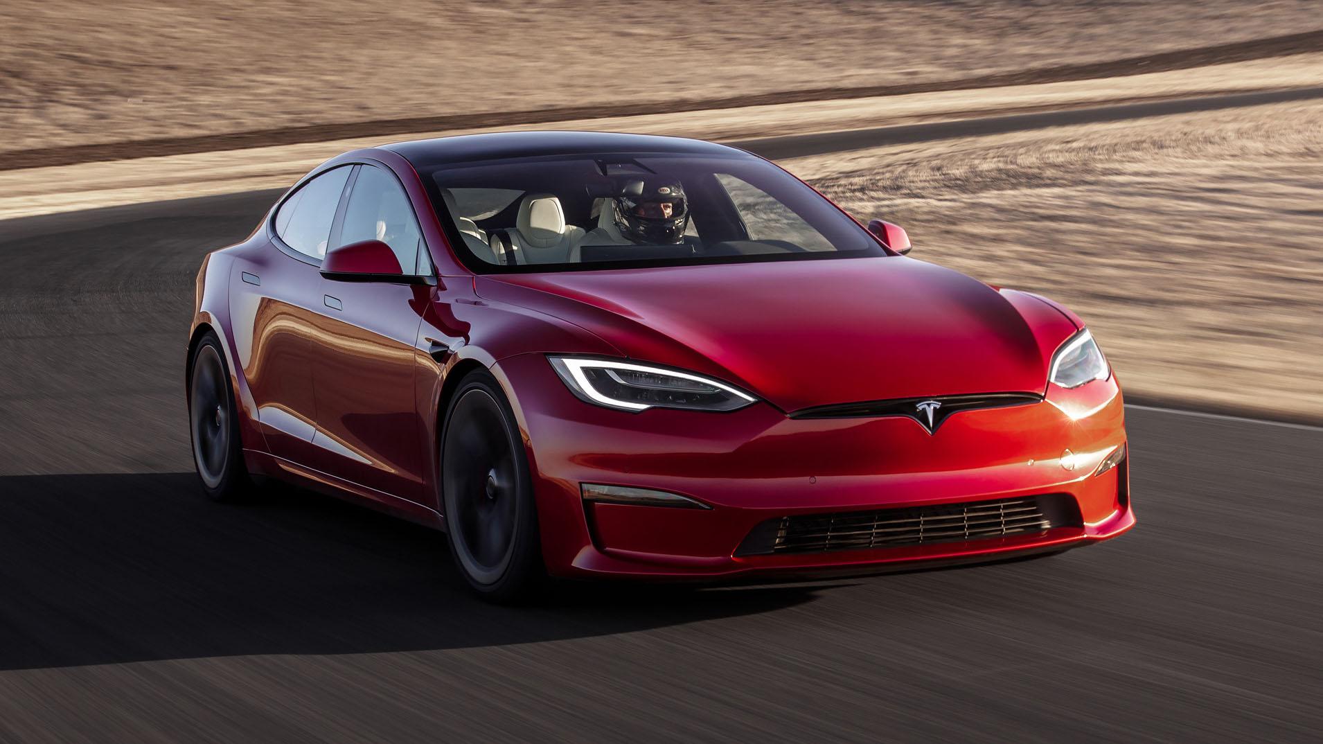 A side view of a Tesla Model S Plaid being tried out on the track