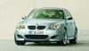 Silver 2005 BMW M5 parked in showroom