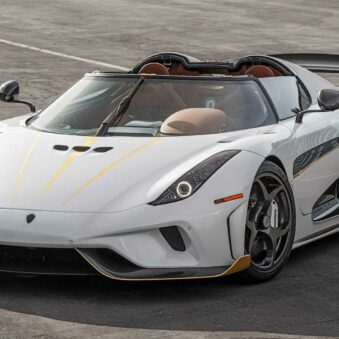 Front view of white 2019 Koenigsegg Regera parked on road