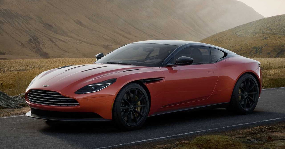 2022 orange Aston Martin DB11 in the Scottish Highlands