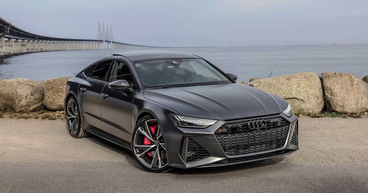 2022 grey Audi RS7 Sportback next to the ocean