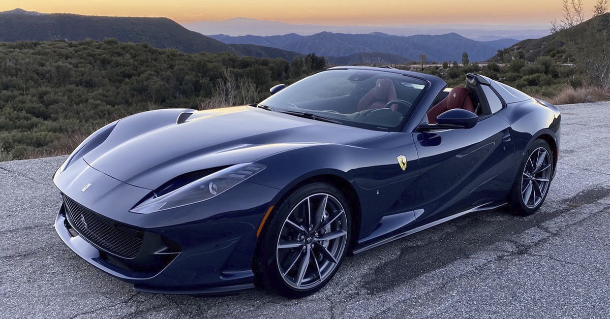 2022 blue Ferrari 812 GTS with mountain background