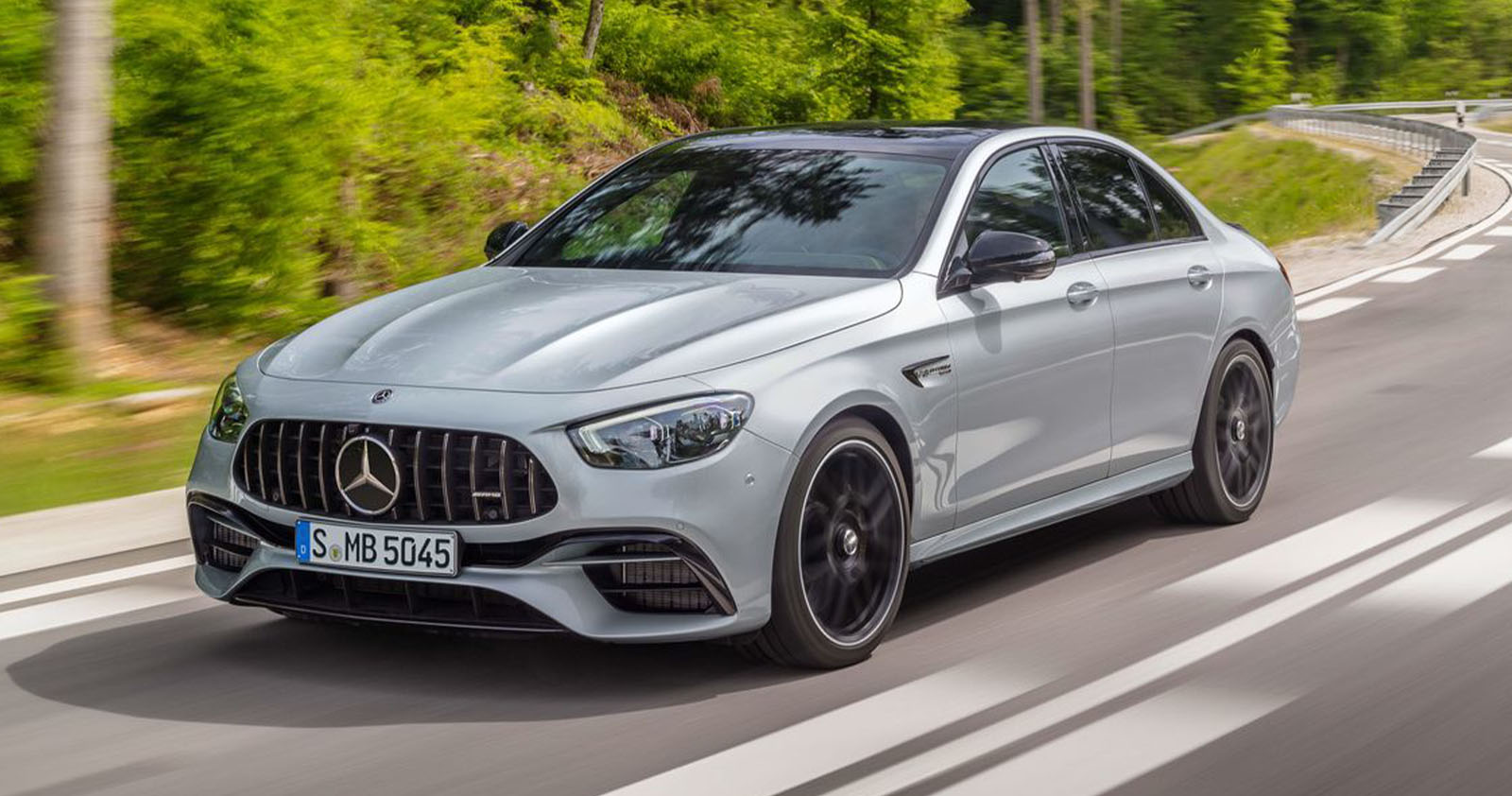 2022 silver Mercedes AMG E 63 S on a twisty road