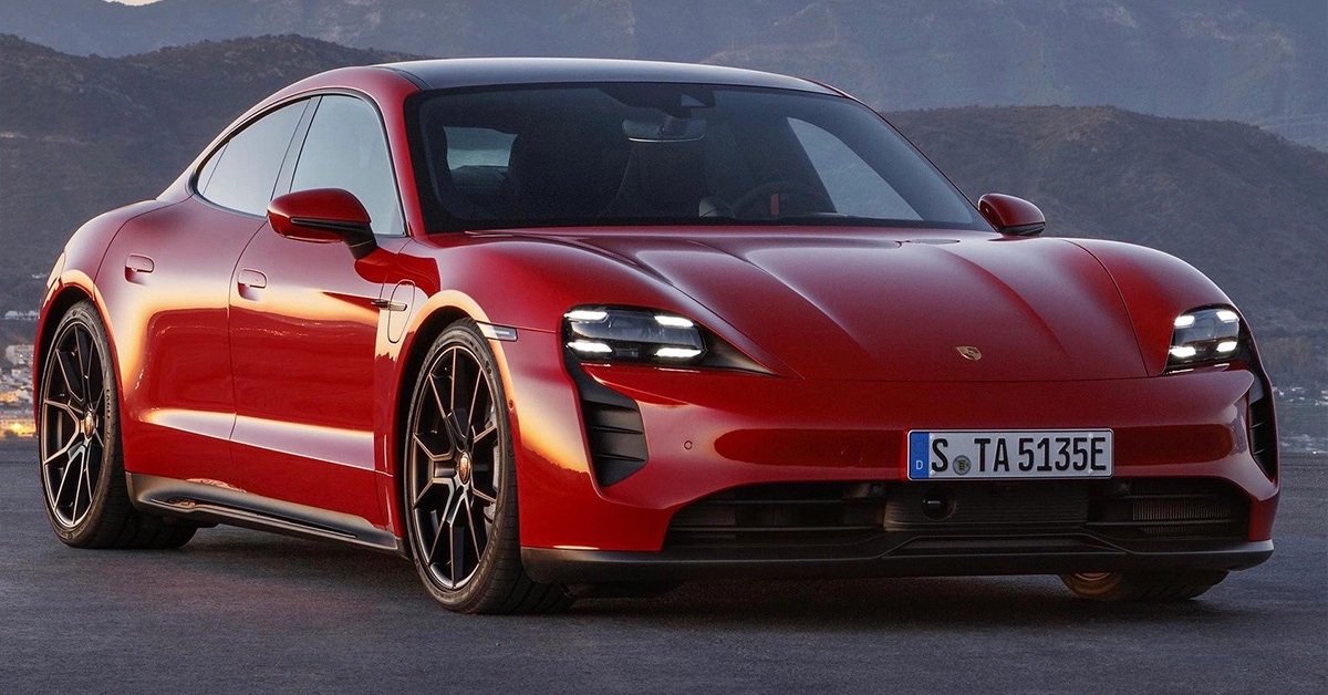 2022 red Porsche Taycan with mountain view
