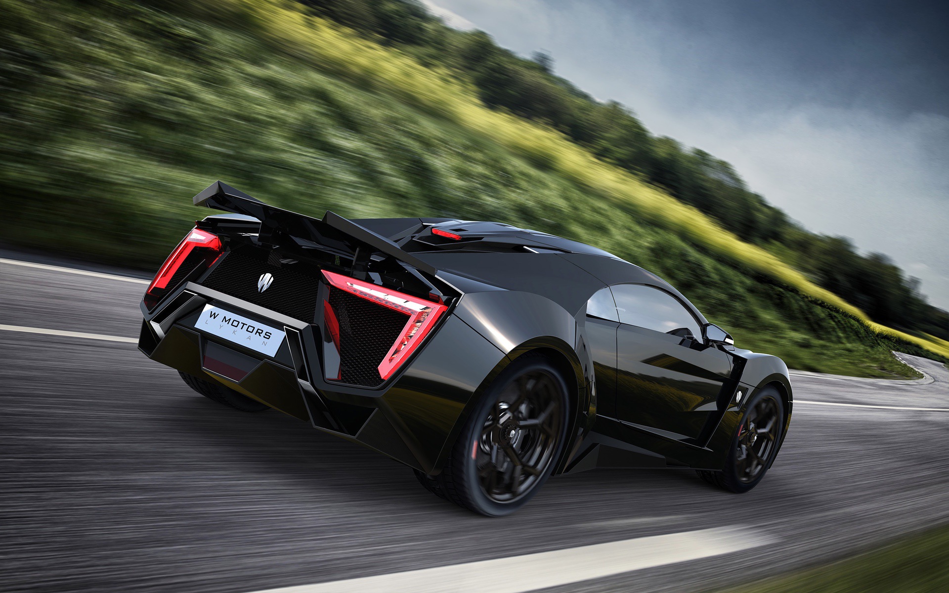 The rear of the car is shaped to channel a lot of air through body to cool the engine as well as create downforce