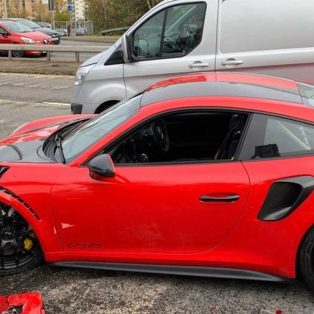 Wrecked red Porsche 911 GT2