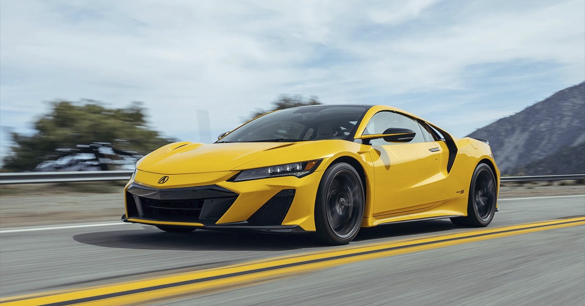  2022 Yellow Acura NSX Type S on a windy road