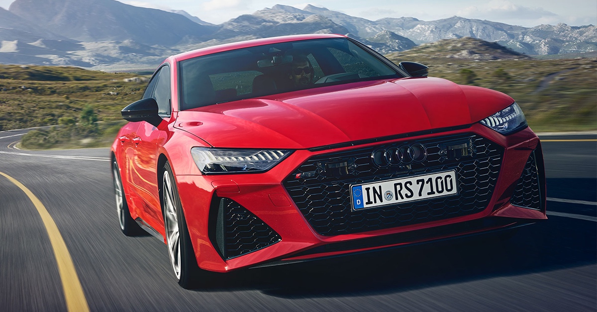 Red Audi RS7 Sportback on a curvy road