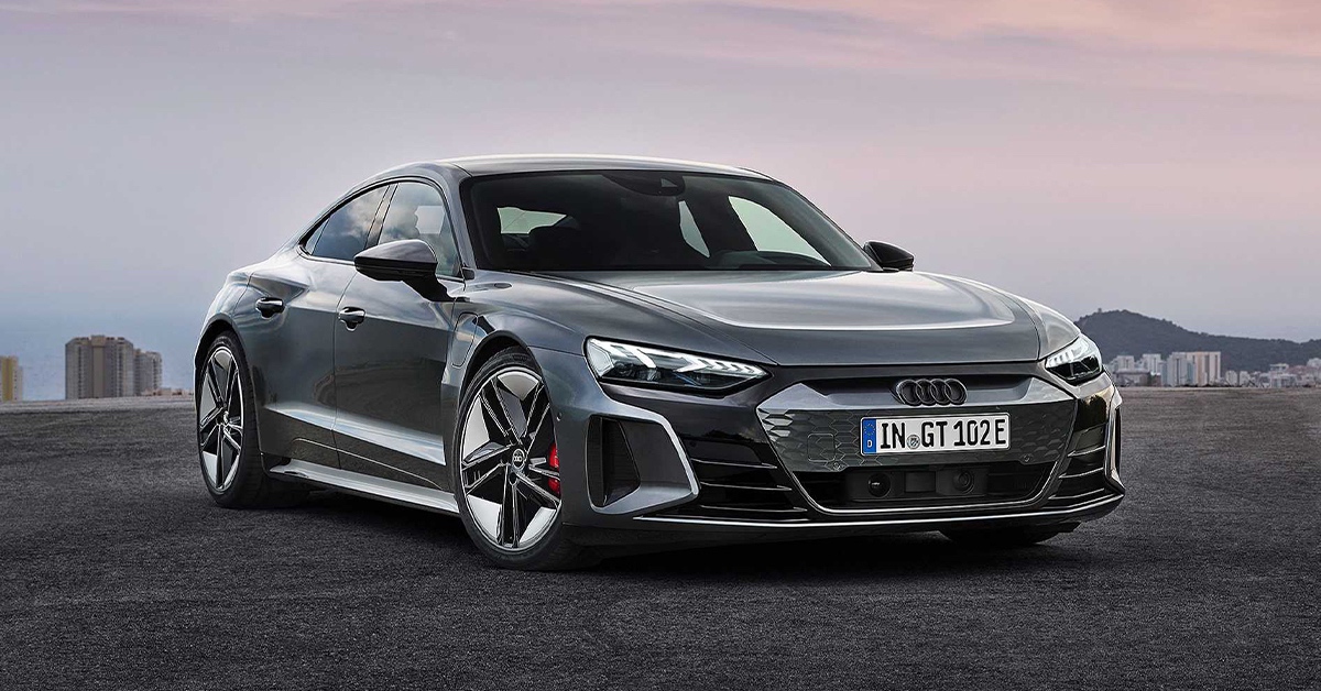 Black Audi RS e-tron with city background