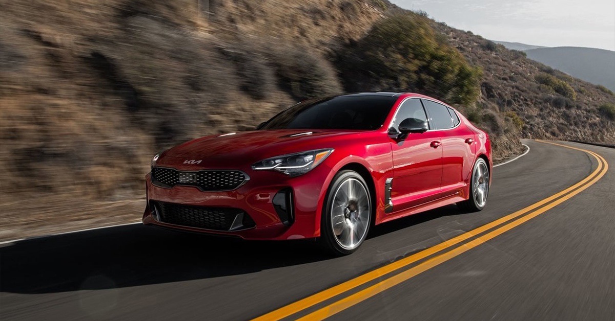 Red Kia Stinger GT-2 on curvy road