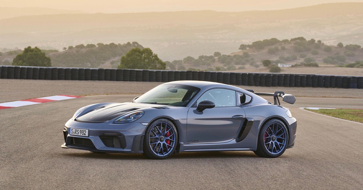 Grey Porsche 718 Cayman GT4 RS on a racetrack