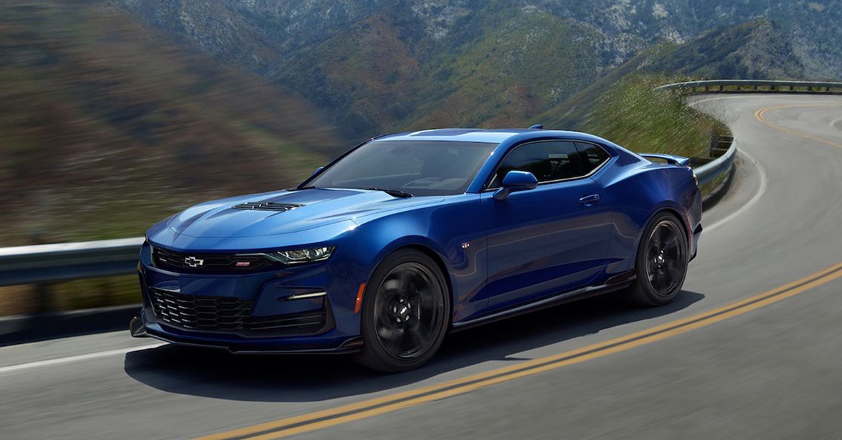 Blue 6th gen Chevrolet Camaro 1SS on a curvy road