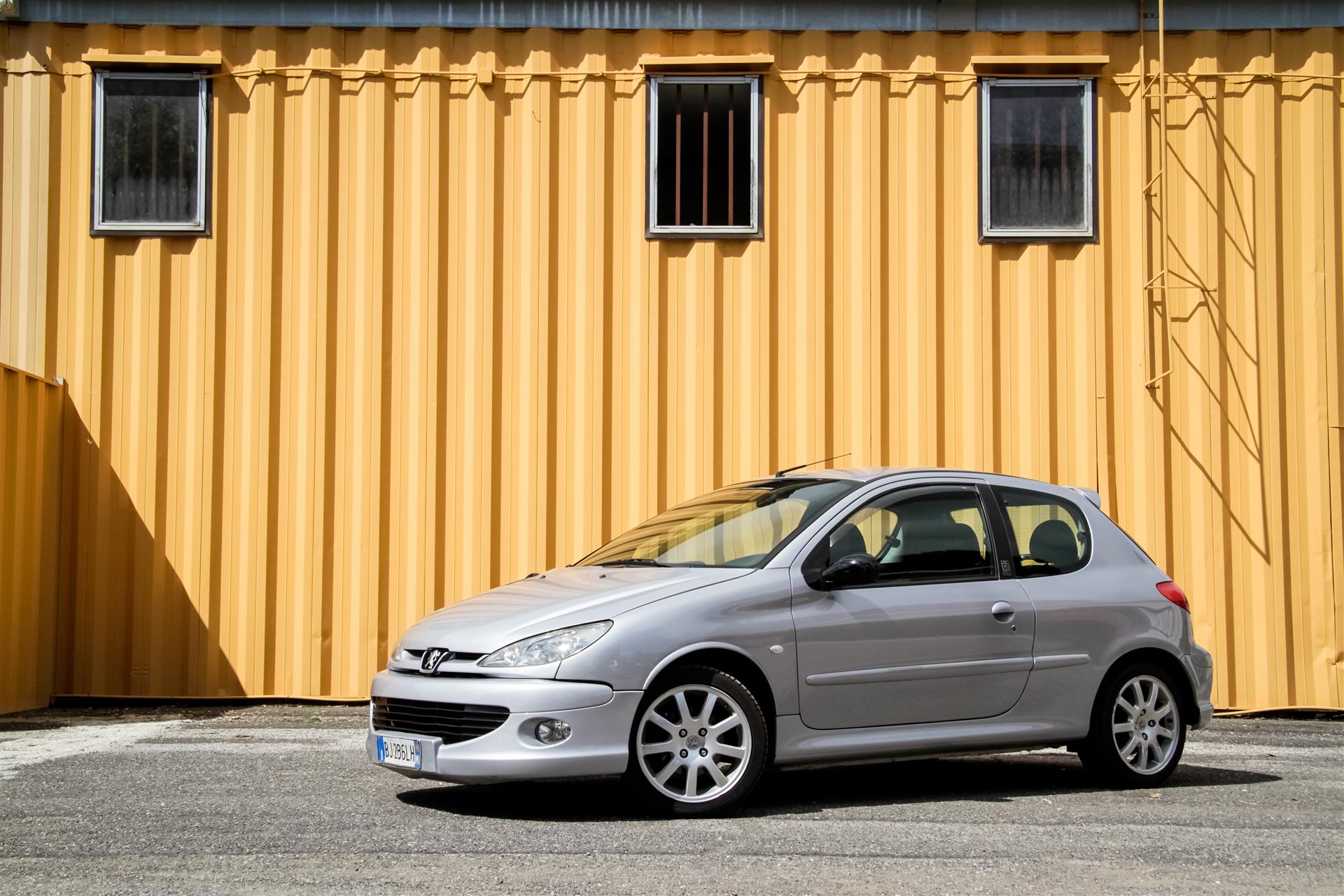 1998 Peugeot 206 Grand Tourisme Static Shot on a yellow industrial backdrop