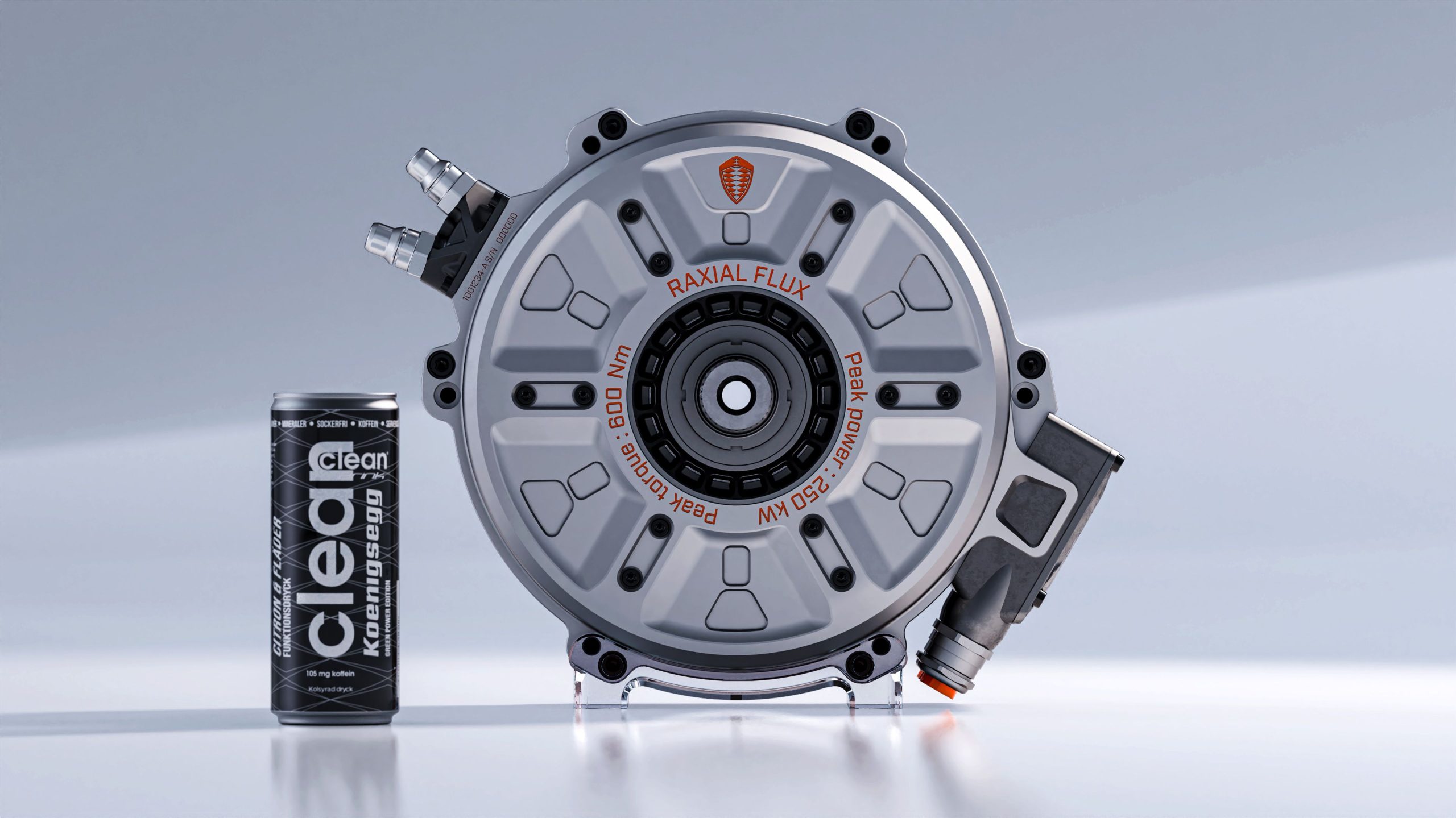 Image showing the 63-pound Koenigsegg Quark electric motor compared to an energy drink can