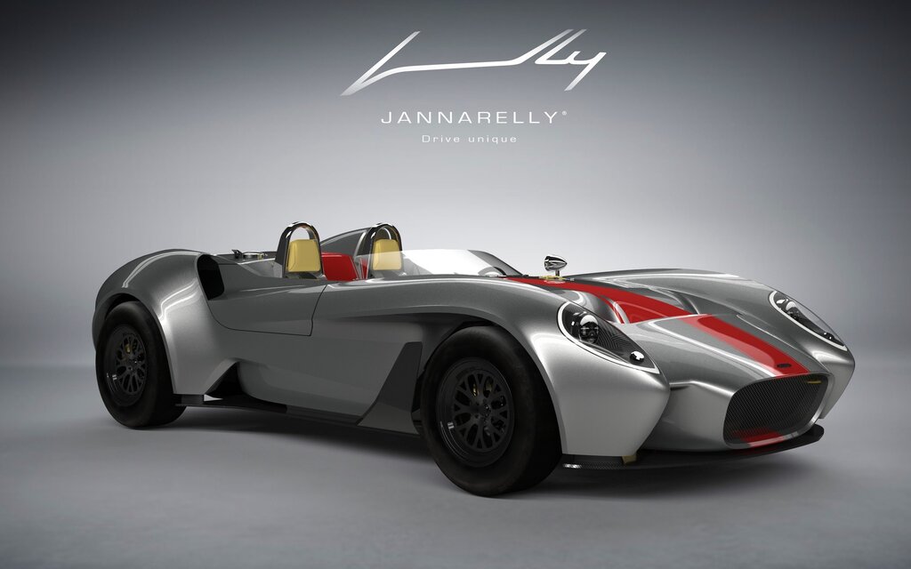Front-angled shot of a silver Jannarelly Design-1 sports car with a red stripe running lengthwise from the hood to the rear.