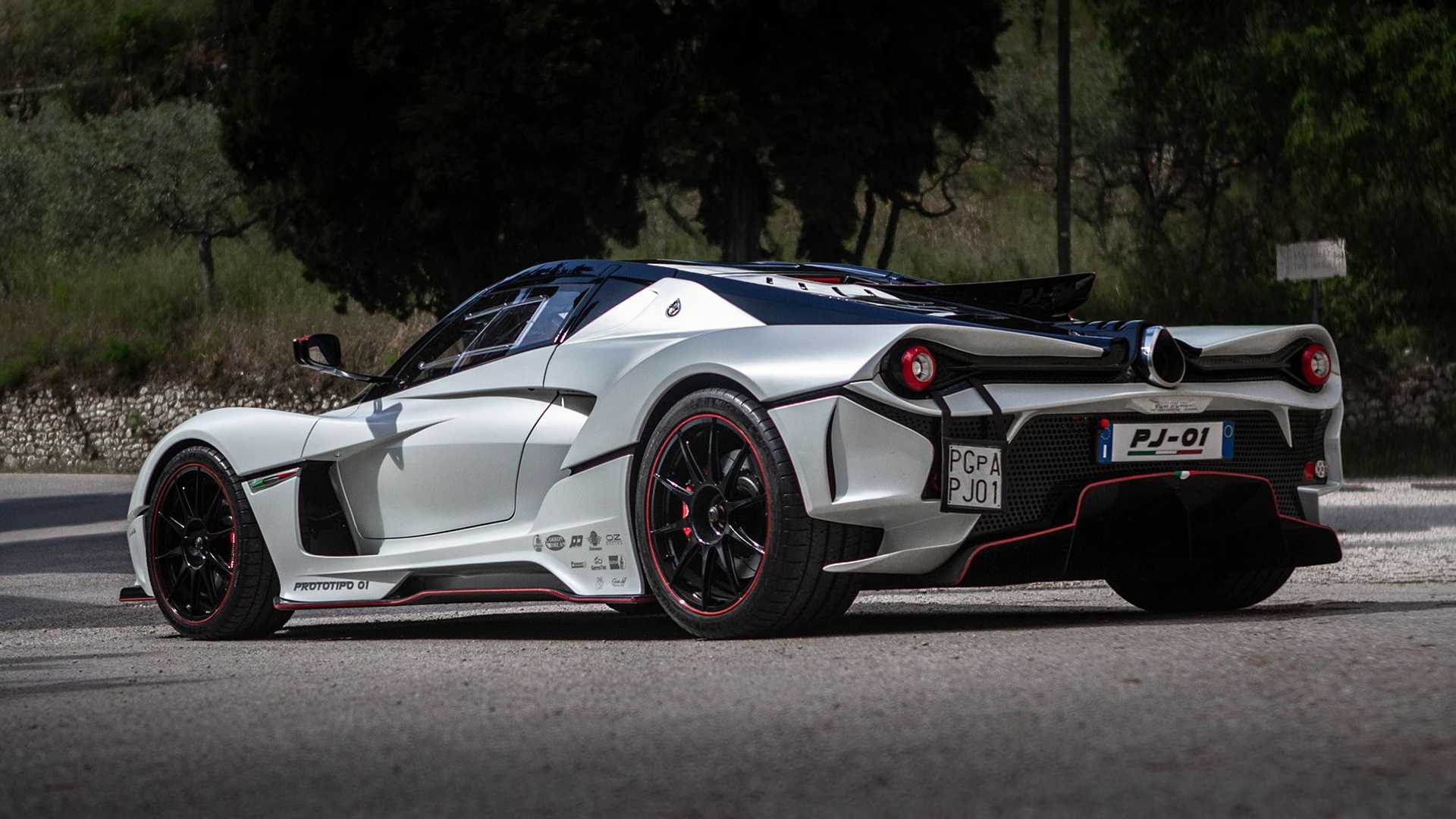 Rear-angled shot of a Pambuffetti PJ-01 hypercar finished in silver with black accents.