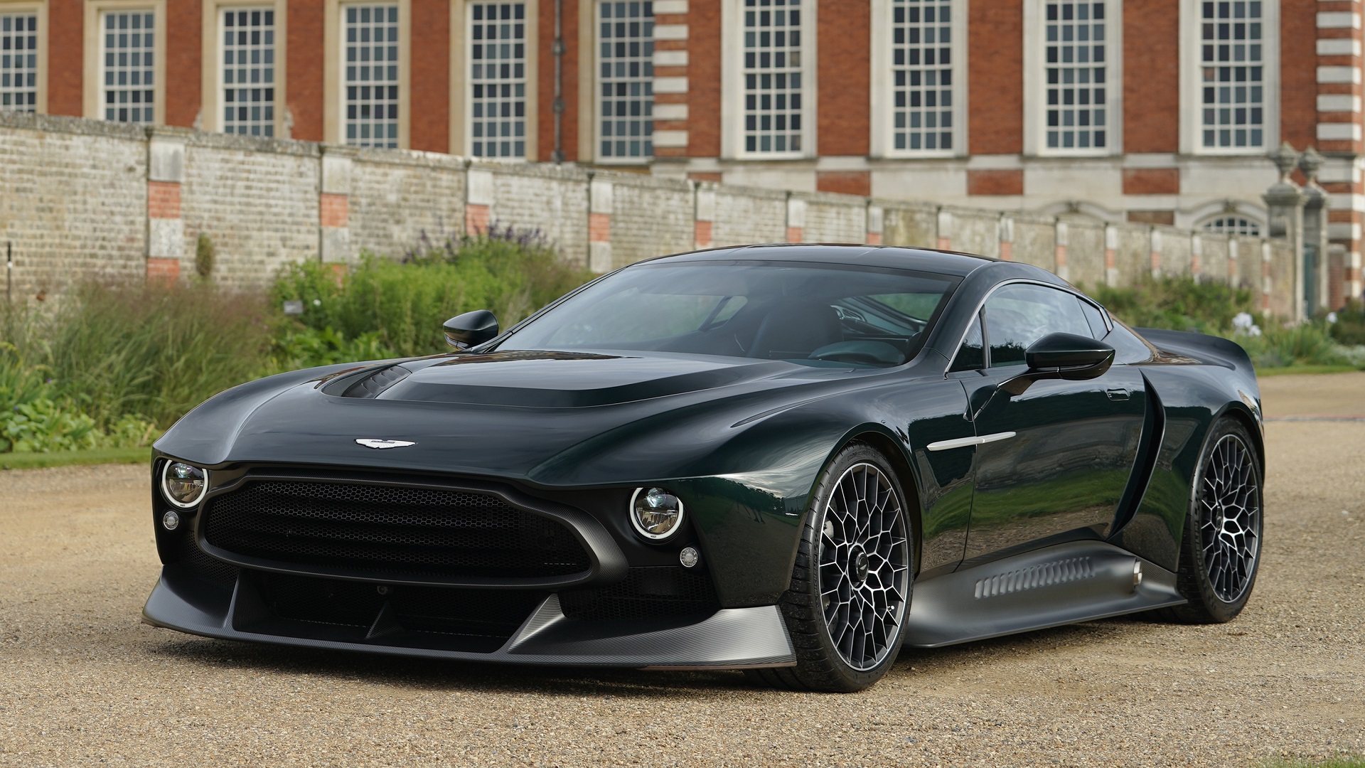 Front-angled shot of the bespoke Aston Martin Victor finished with a dark green coat.