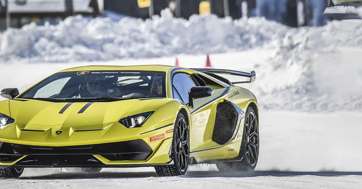 yellow Lamborghini Aventador in a snow training program