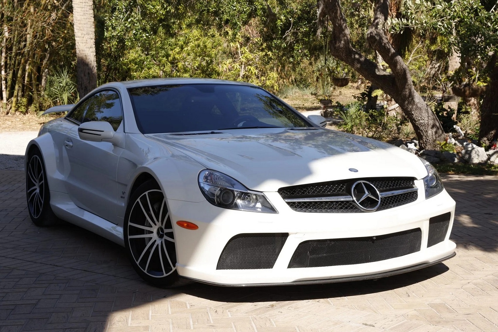 front-angled-view of a white 2009 mercedes benz sl65 amg black series