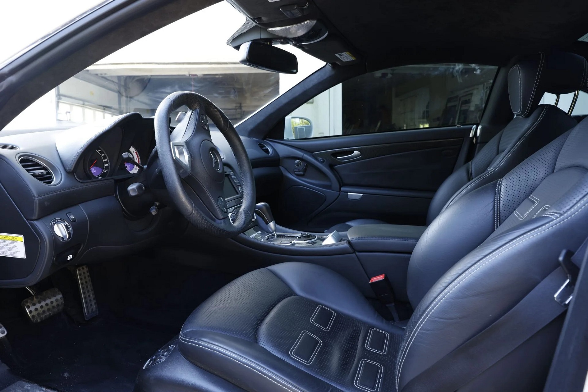 Interior of a white 2009 mercedes benz sl65 amg black series