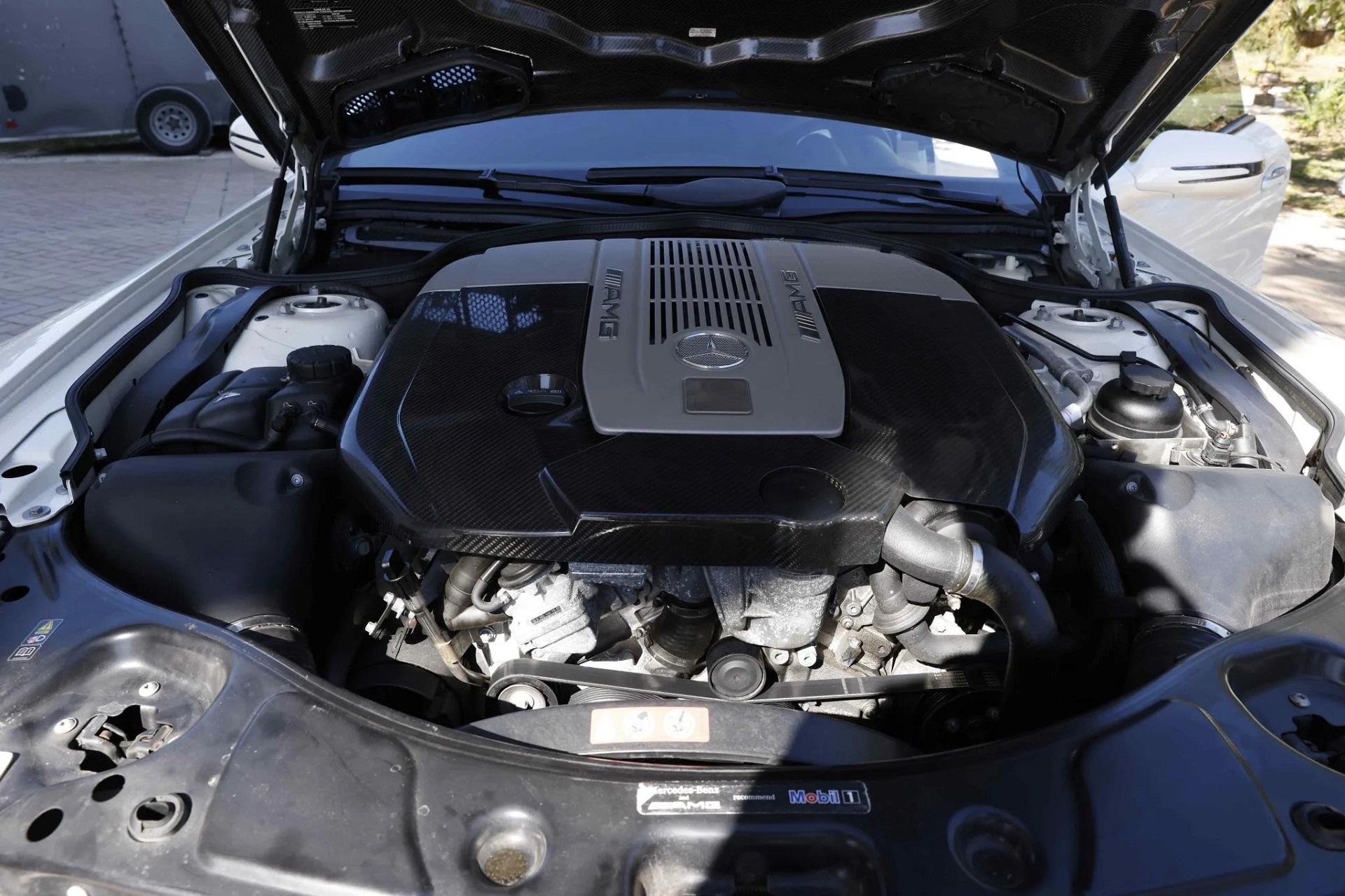 A look at the engine of a white 2009 mercedes benz sl65 amg black series