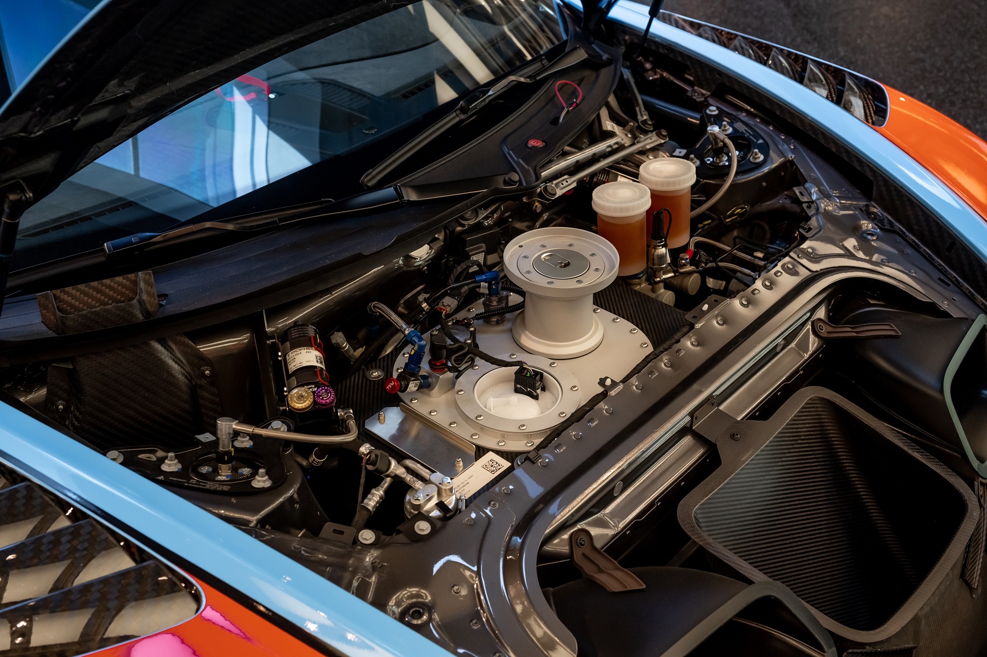 Engine bay of a Gulf-liveried 2019 Porsche 935