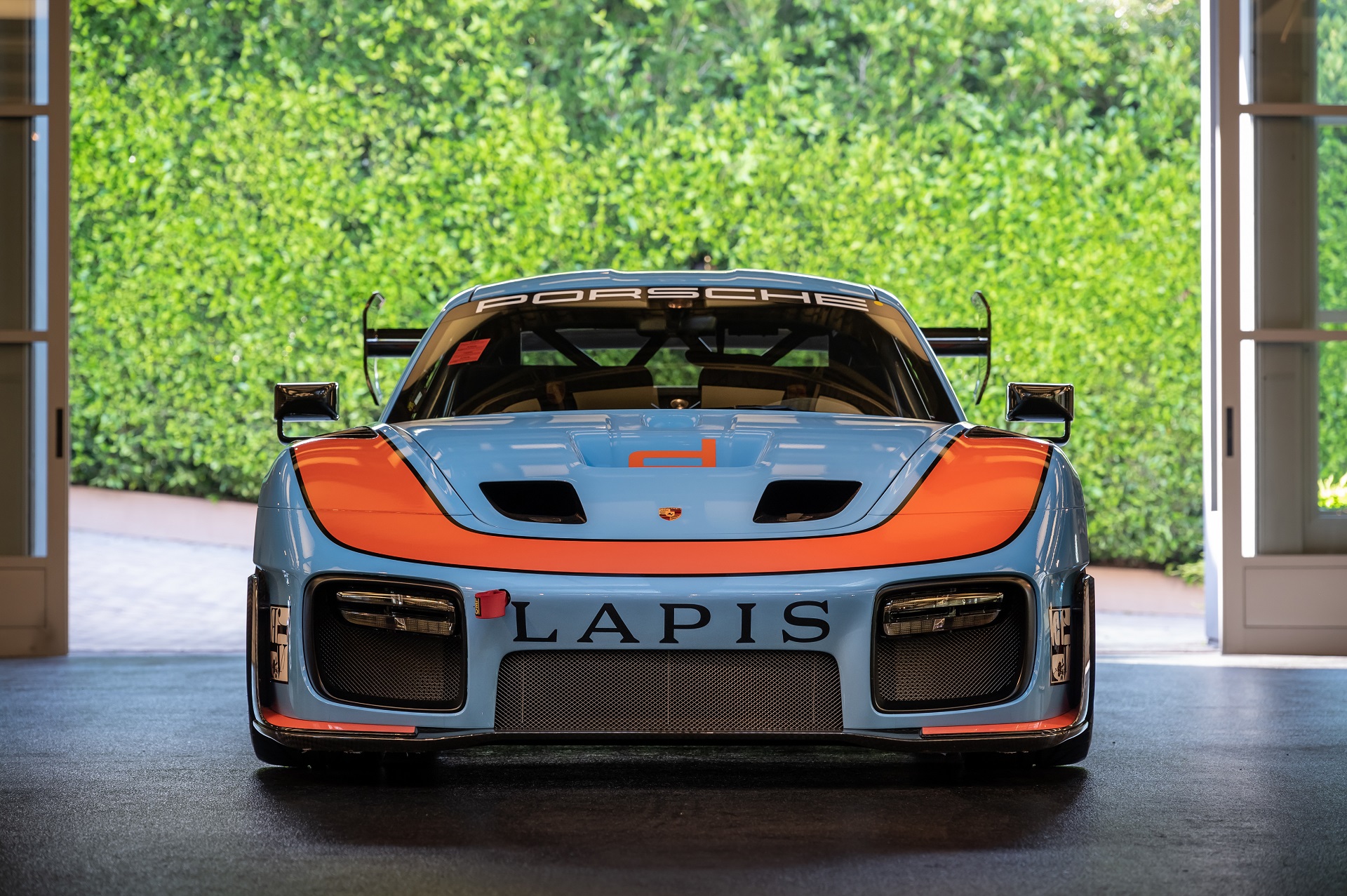 frontal view of a Gulf-liveried 2019 Porsche 935