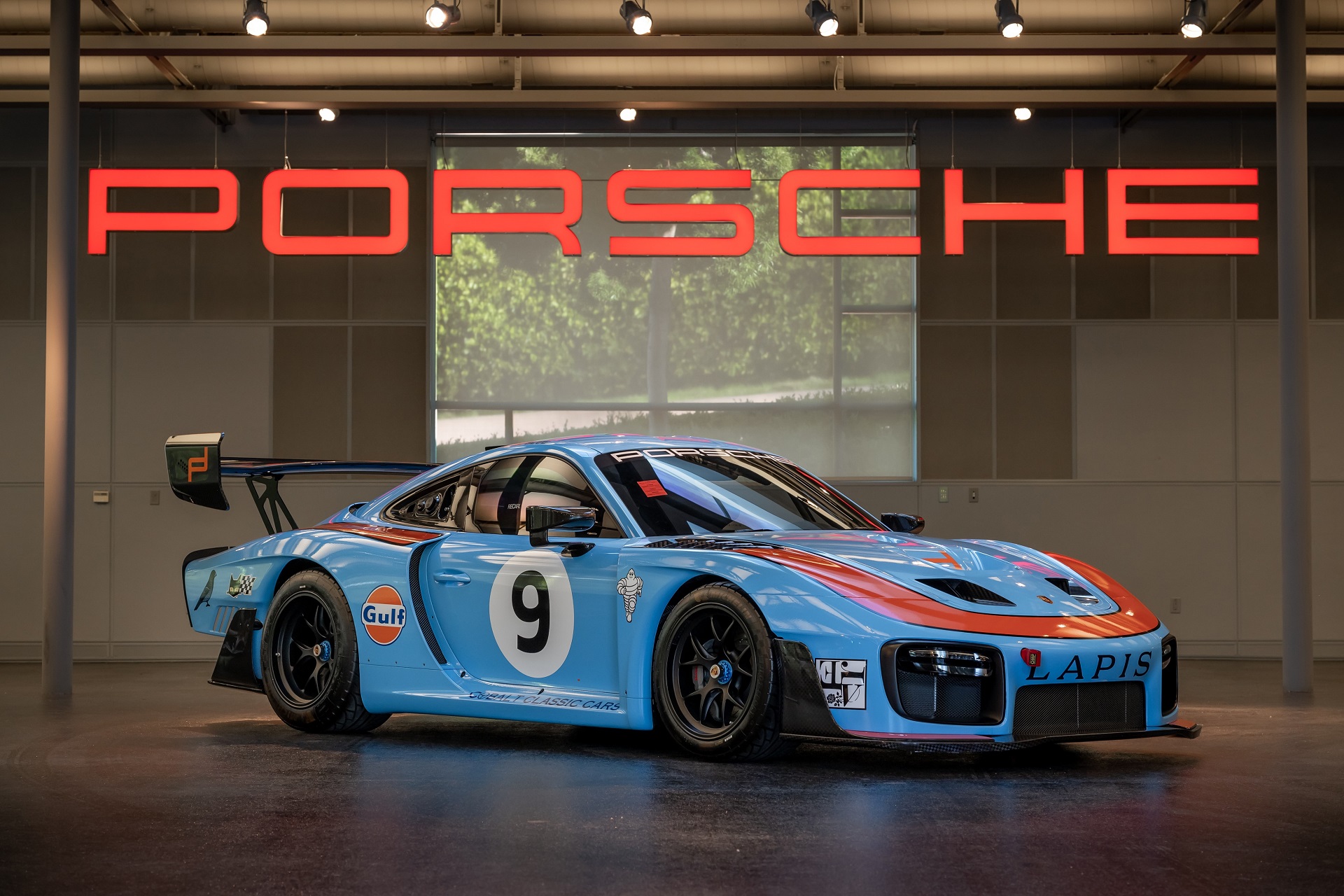 front-angled view of a Gulf-liveried 2019 Porsche 935
