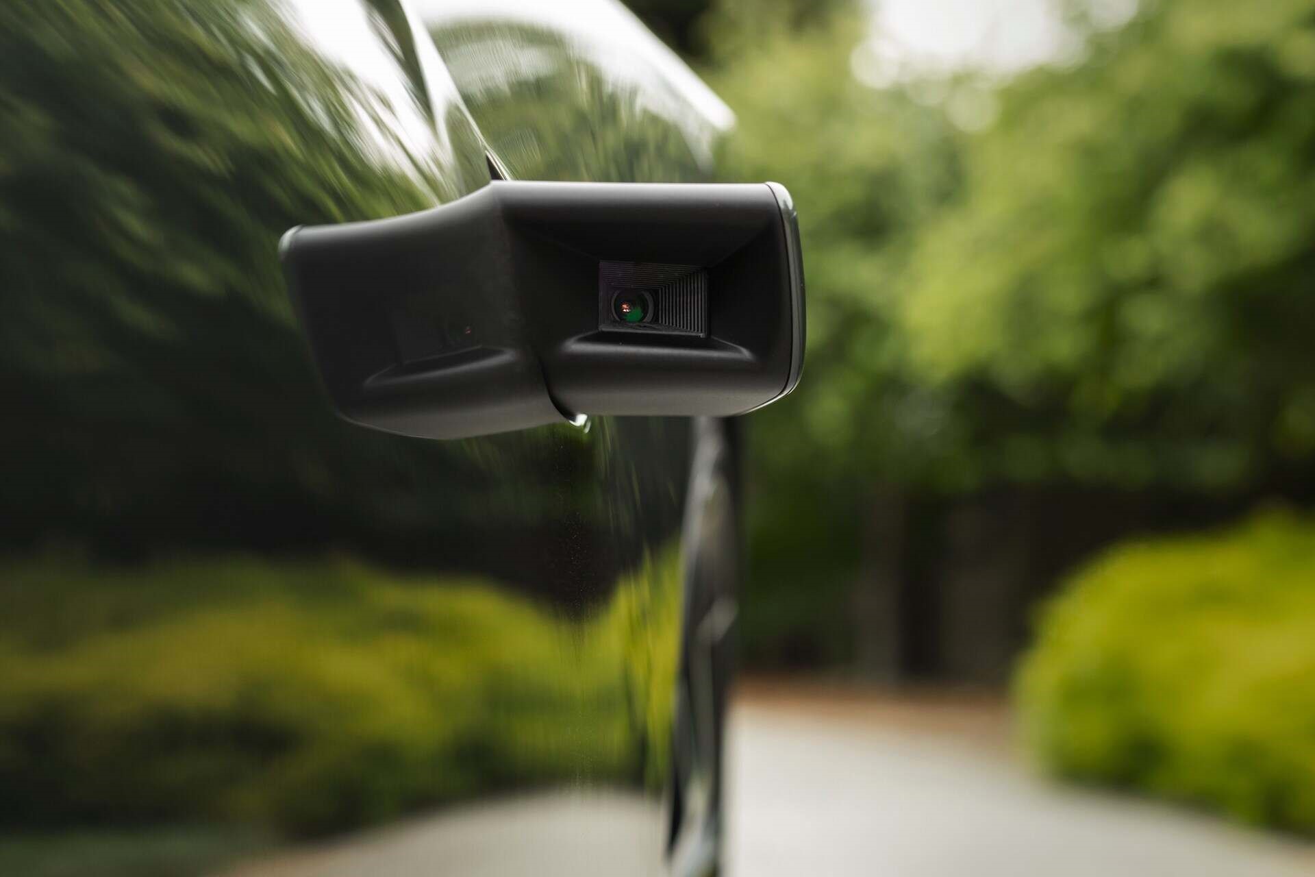 View of the retractable side camaera of a 2020 Grey McLaren Speedtail.