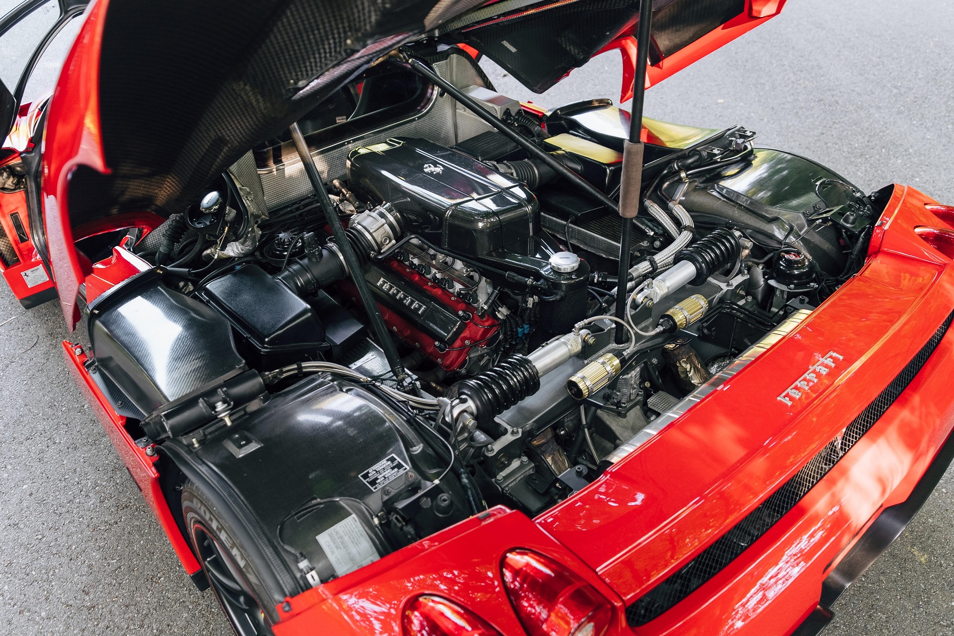 Engine bay view of the red 2003 Ferrari Enzo