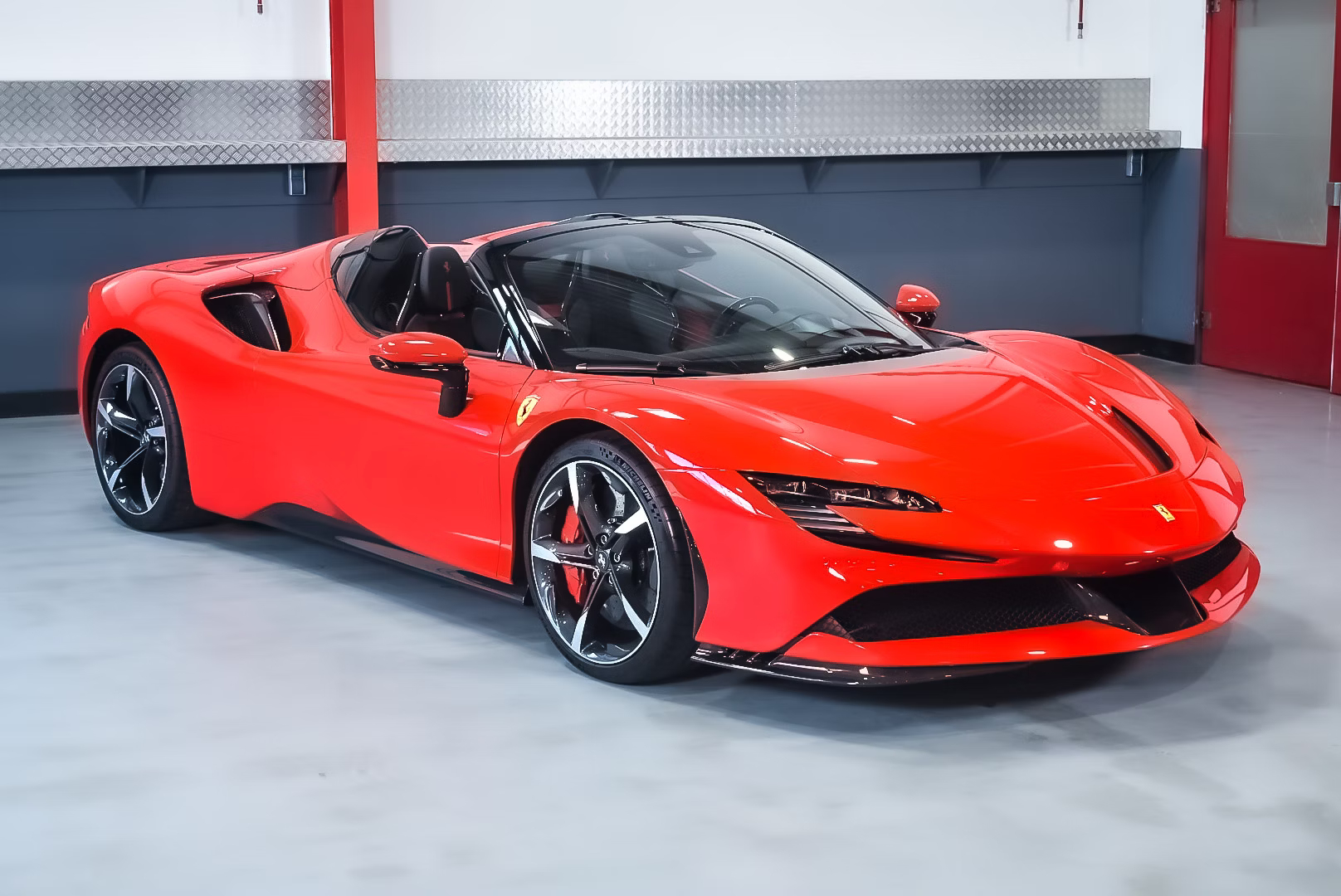 front-angled-view-of-a-2022-Rosso-Corsa-Ferrari-SF90-Spider