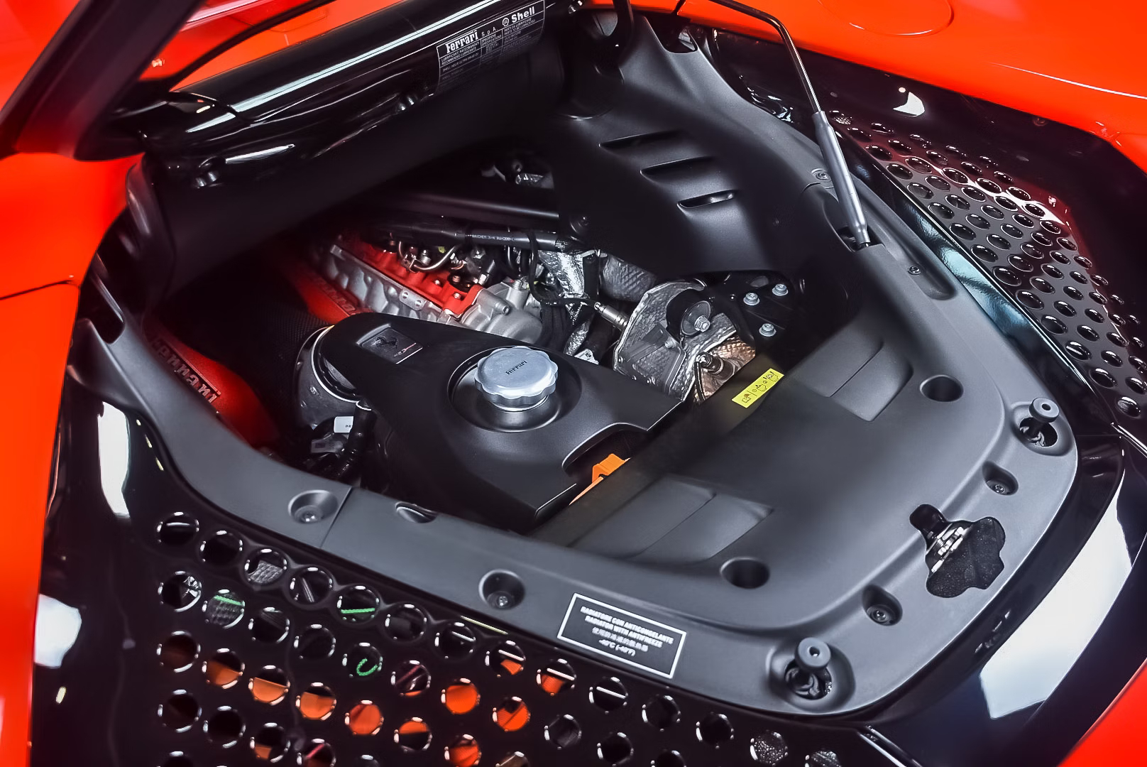 Engine-bay-of-a-2022-Rosso-Corsa-Ferrari-SF90-Spider