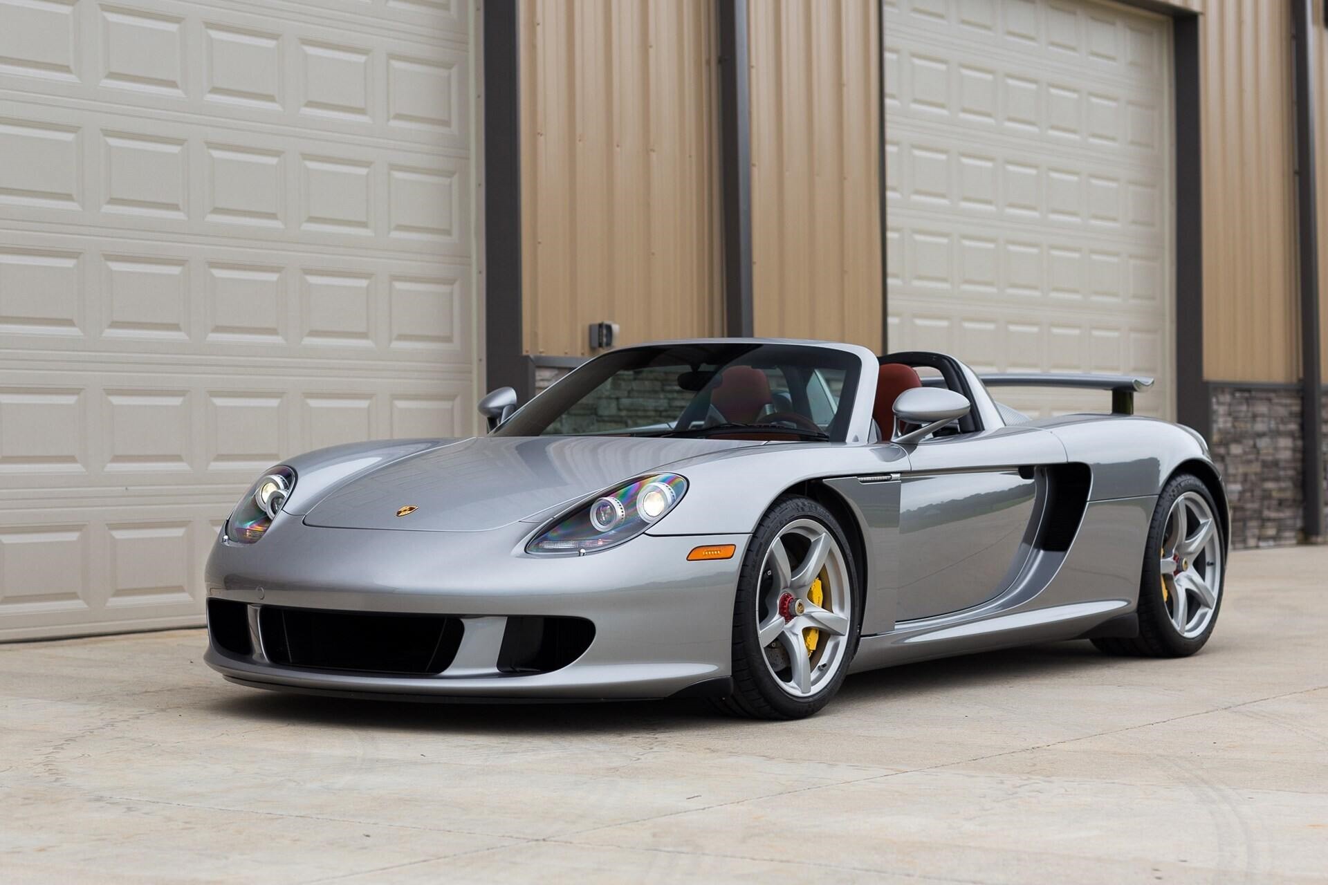 front-angled view of a silver 2005 Porsche Carrera GT