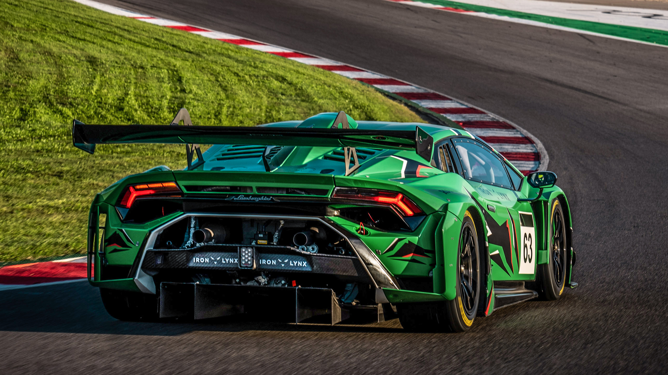 rear-angled view of a Lamborghini Huracan GT3 EVO2 on a race track.