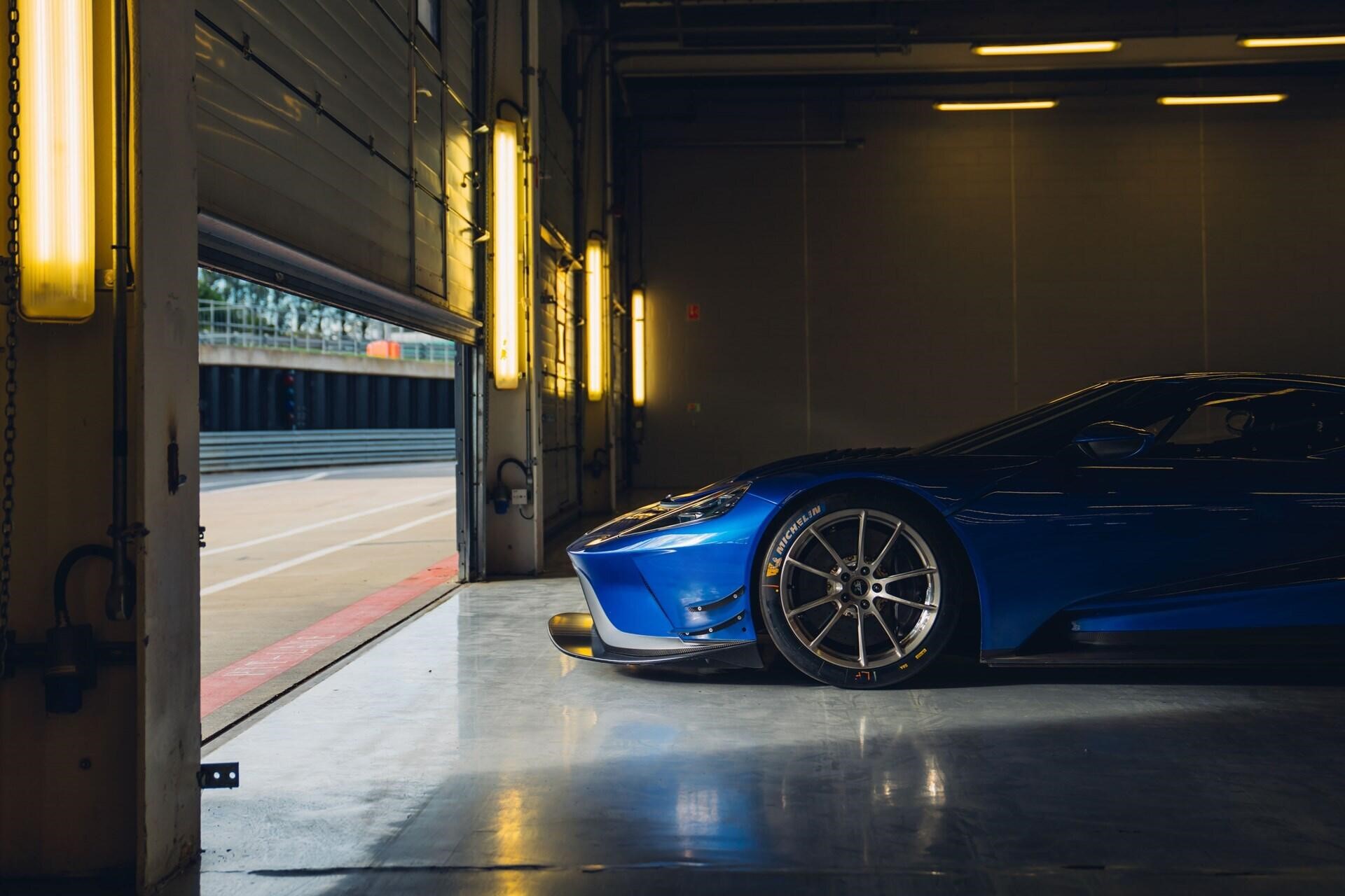 side profile showing the front half of a blue 2020 Ford GT MK II track-only supercar