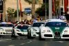 Image showing a Bugatti Veyron, Ferrari FF, McLaren MP4-12C and Bentley Continental GT - all part of the Dubai Police Force.