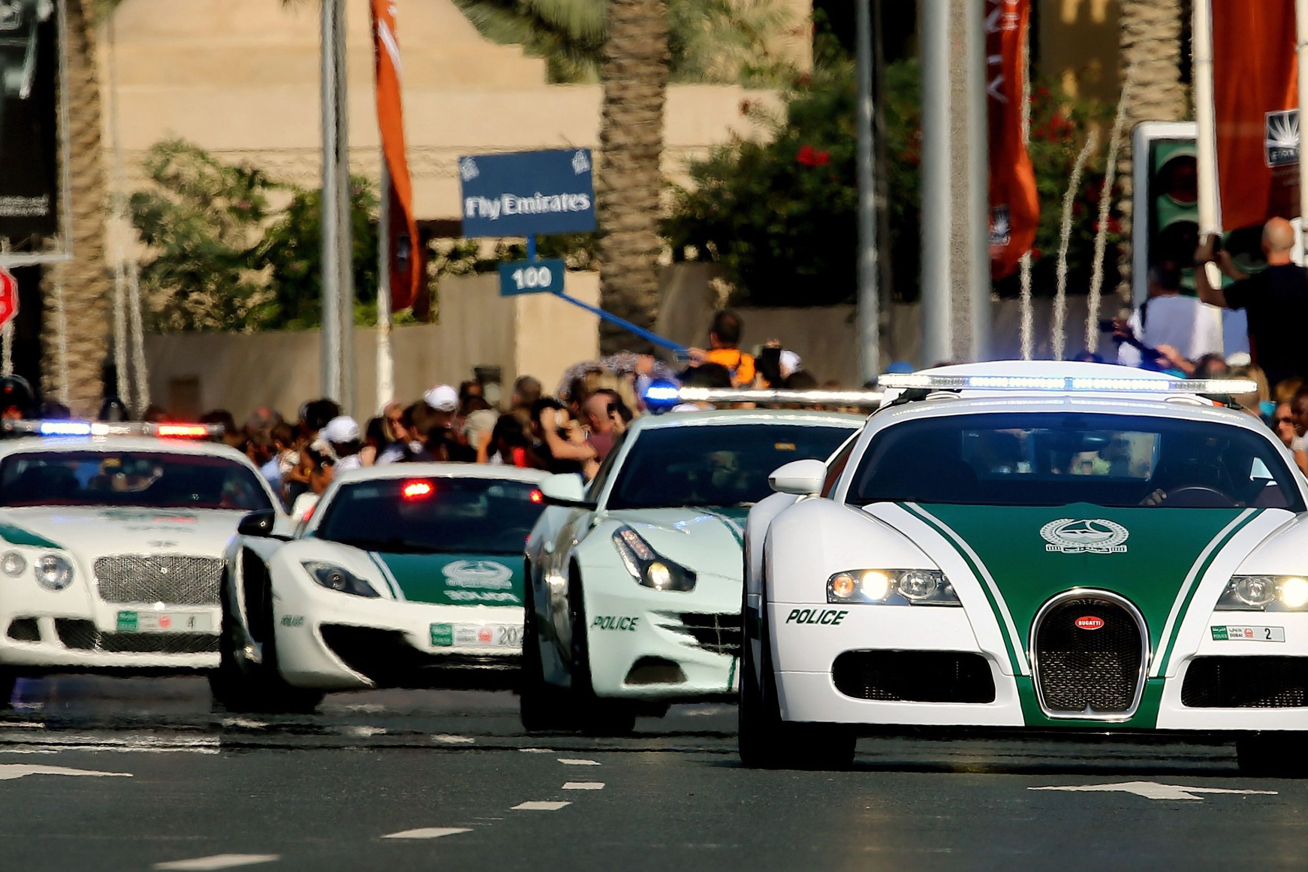 Image showing a Bugatti Veyron, Ferrari FF, McLaren MP4-12C and Bentley Continental GT - all part of the Dubai Police Force.